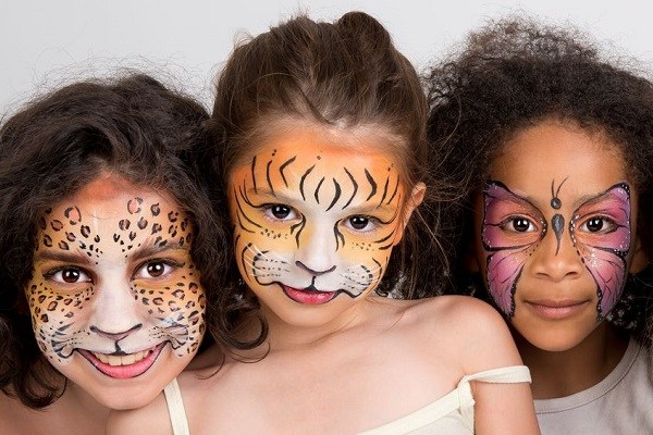 20999808 - beautiful young girls with animal painted faces